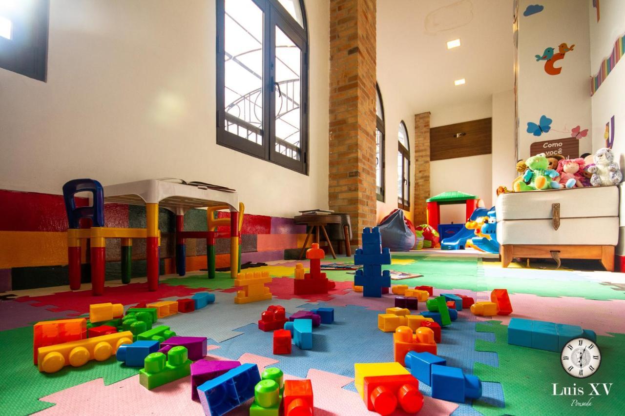 Pousada Luis XV Campos do Jordao Dış mekan fotoğraf A nursery in Spain