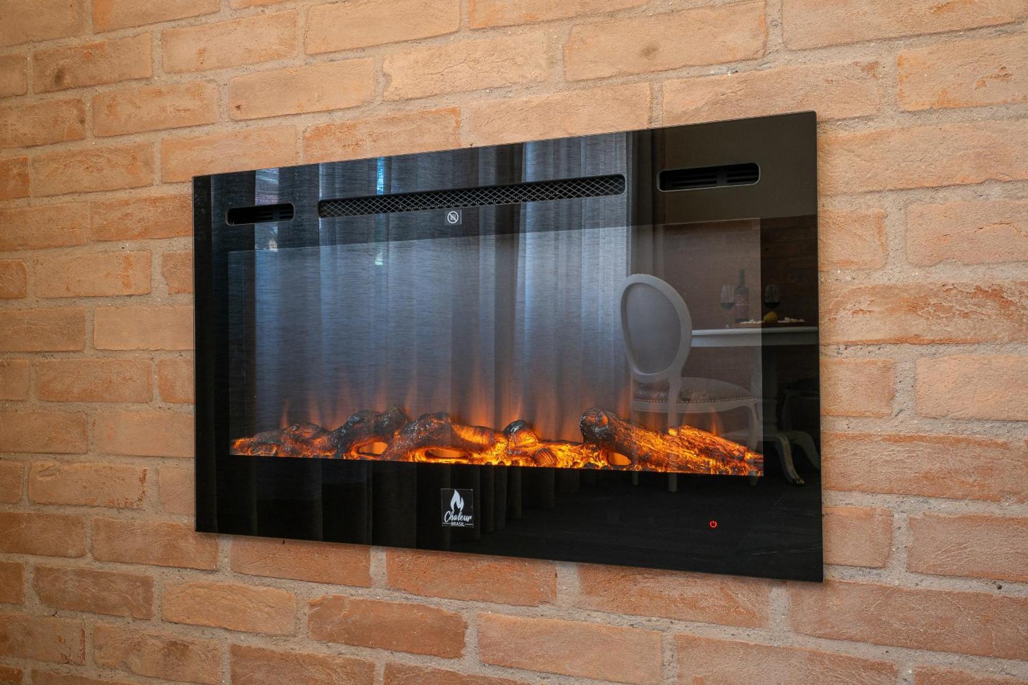 Pousada Luis XV Campos do Jordao Dış mekan fotoğraf A wall mounted electric fireplace